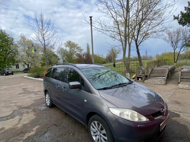 Серый Мазда 5, объемом двигателя 2 л и пробегом 300 тыс. км за 5300 $, фото 1 на Automoto.ua
