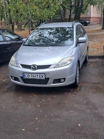 Серый Мазда 5, объемом двигателя 2 л и пробегом 262 тыс. км за 6000 $, фото 1 на Automoto.ua