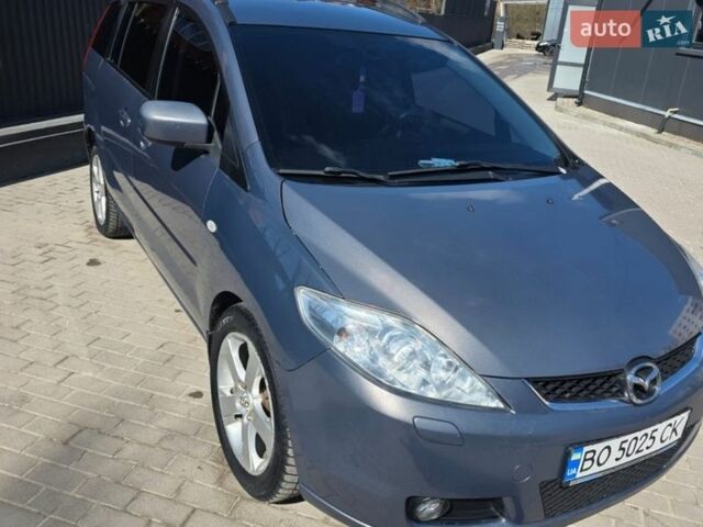 Серый Мазда 5, объемом двигателя 2 л и пробегом 301 тыс. км за 4800 $, фото 1 на Automoto.ua