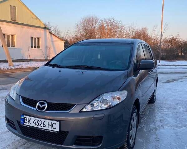 Серый Мазда 5, объемом двигателя 1.8 л и пробегом 212 тыс. км за 5500 $, фото 1 на Automoto.ua