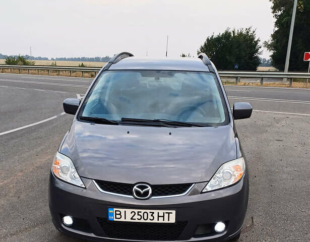 Серый Мазда 5, объемом двигателя 2 л и пробегом 184 тыс. км за 5500 $, фото 1 на Automoto.ua