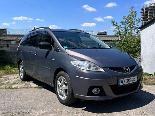 Серый Мазда 5, объемом двигателя 2 л и пробегом 335 тыс. км за 6000 $, фото 1 на Automoto.ua