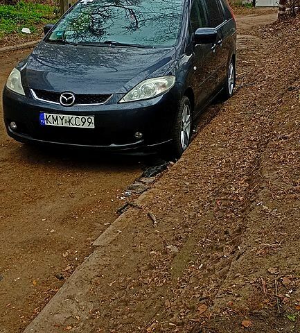 Серый Мазда 5, объемом двигателя 1.8 л и пробегом 314 тыс. км за 4000 $, фото 1 на Automoto.ua