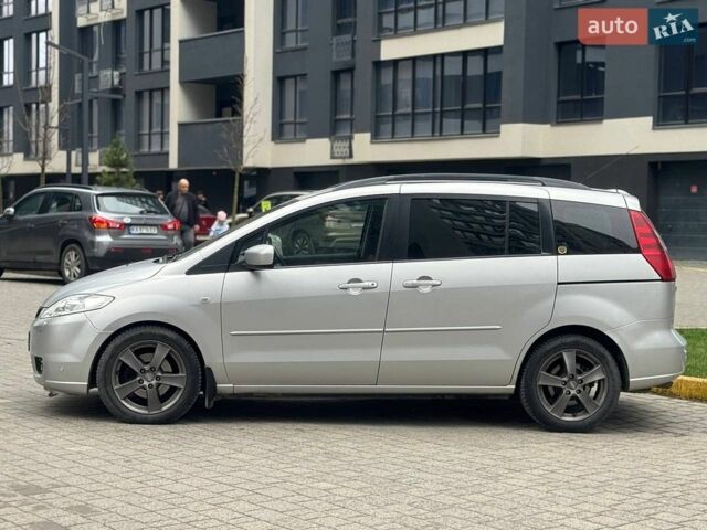Серый Мазда 5, объемом двигателя 2 л и пробегом 299 тыс. км за 6500 $, фото 1 на Automoto.ua