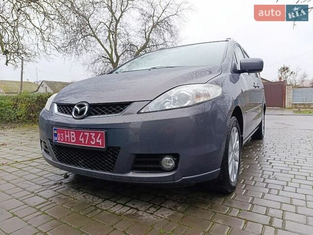 Серый Мазда 5, объемом двигателя 1.8 л и пробегом 235 тыс. км за 6000 $, фото 1 на Automoto.ua