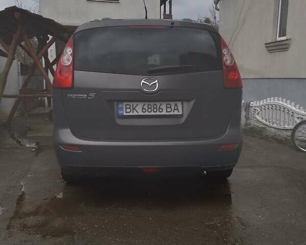 Серый Мазда 5, объемом двигателя 2 л и пробегом 330 тыс. км за 5000 $, фото 1 на Automoto.ua