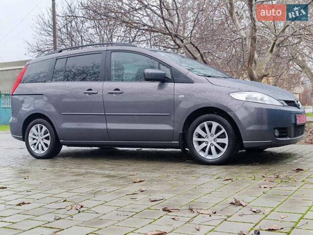 Серый Мазда 5, объемом двигателя 1.8 л и пробегом 235 тыс. км за 6700 $, фото 1 на Automoto.ua