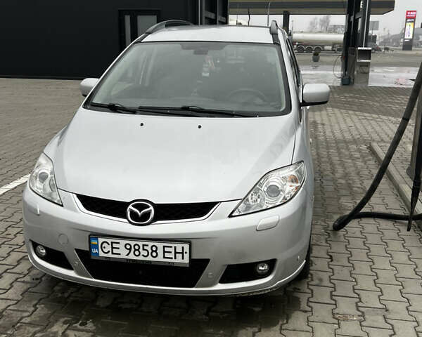 Серый Мазда 5, объемом двигателя 2 л и пробегом 377 тыс. км за 5500 $, фото 1 на Automoto.ua
