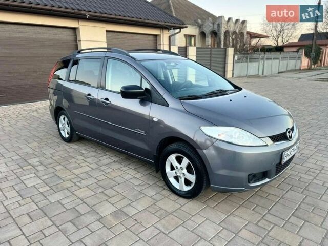 Серый Мазда 5, объемом двигателя 2 л и пробегом 249 тыс. км за 4300 $, фото 1 на Automoto.ua