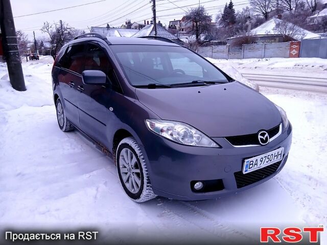 Серый Мазда 5, объемом двигателя 2 л и пробегом 317 тыс. км за 5500 $, фото 1 на Automoto.ua