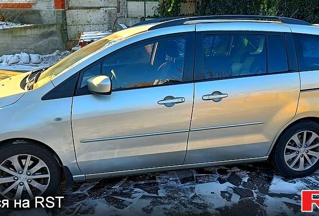 Серый Мазда 5, объемом двигателя 2 л и пробегом 305 тыс. км за 4900 $, фото 1 на Automoto.ua