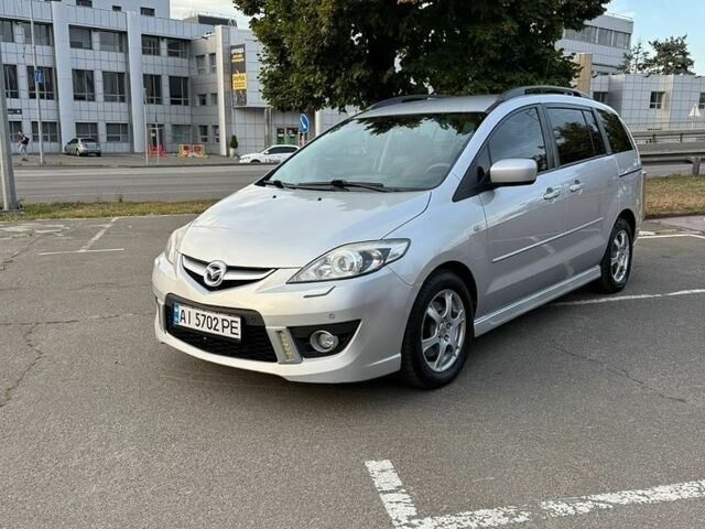 Серый Мазда 5, объемом двигателя 2 л и пробегом 284 тыс. км за 6800 $, фото 1 на Automoto.ua