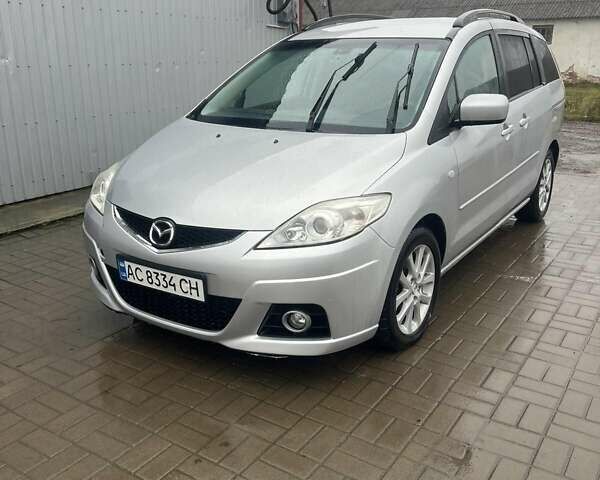 Серый Мазда 5, объемом двигателя 2 л и пробегом 320 тыс. км за 5300 $, фото 1 на Automoto.ua