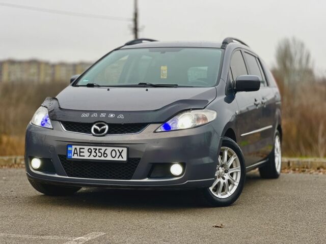 Серый Мазда 5, объемом двигателя 2 л и пробегом 200 тыс. км за 5999 $, фото 1 на Automoto.ua