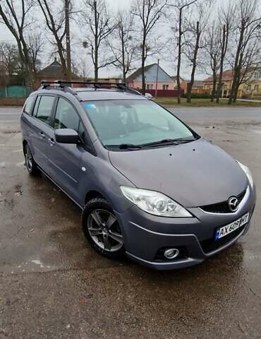 Серый Мазда 5, объемом двигателя 2 л и пробегом 290 тыс. км за 5400 $, фото 1 на Automoto.ua
