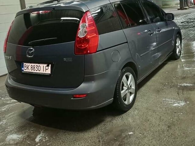 Серый Мазда 5, объемом двигателя 2 л и пробегом 335 тыс. км за 5100 $, фото 1 на Automoto.ua