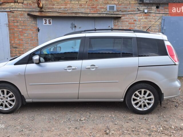Серый Мазда 5, объемом двигателя 2 л и пробегом 226 тыс. км за 6200 $, фото 1 на Automoto.ua