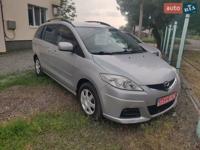 Серый Мазда 5, объемом двигателя 1.8 л и пробегом 221 тыс. км за 6200 $, фото 1 на Automoto.ua