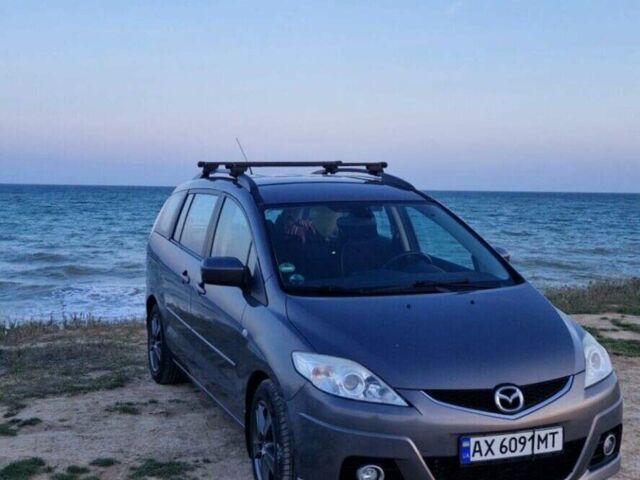 Серый Мазда 5, объемом двигателя 2 л и пробегом 290 тыс. км за 5400 $, фото 1 на Automoto.ua