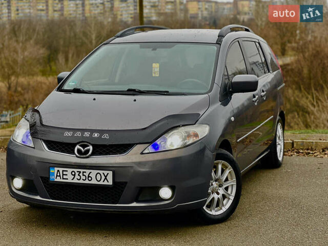 Серый Мазда 5, объемом двигателя 2 л и пробегом 199 тыс. км за 5950 $, фото 1 на Automoto.ua