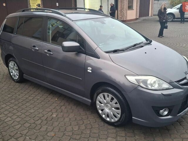 Серый Мазда 5, объемом двигателя 2 л и пробегом 206 тыс. км за 6500 $, фото 1 на Automoto.ua