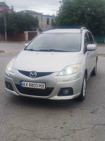 Серый Мазда 5, объемом двигателя 2 л и пробегом 277 тыс. км за 6250 $, фото 1 на Automoto.ua