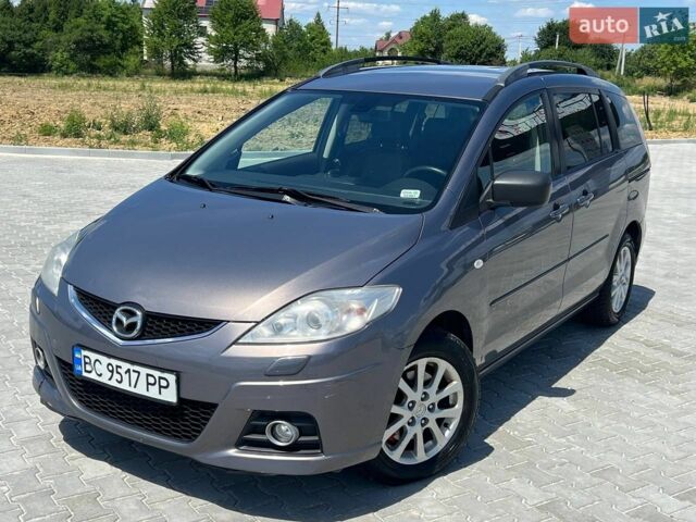 Серый Мазда 5, объемом двигателя 2 л и пробегом 338 тыс. км за 6500 $, фото 1 на Automoto.ua