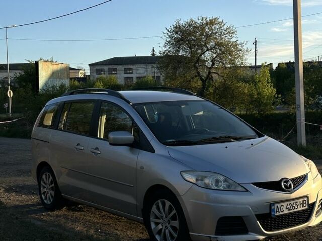 Серый Мазда 5, объемом двигателя 2 л и пробегом 286 тыс. км за 4550 $, фото 1 на Automoto.ua