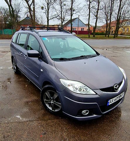 Серый Мазда 5, объемом двигателя 2 л и пробегом 290 тыс. км за 6490 $, фото 1 на Automoto.ua