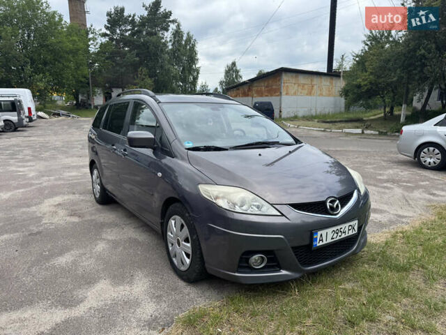 Серый Мазда 5, объемом двигателя 2 л и пробегом 222 тыс. км за 6399 $, фото 1 на Automoto.ua