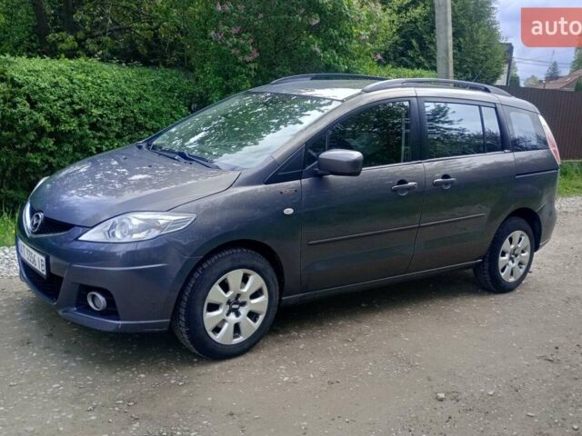 Серый Мазда 5, объемом двигателя 2 л и пробегом 302 тыс. км за 5100 $, фото 1 на Automoto.ua