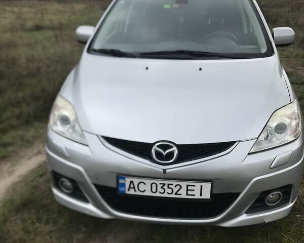 Серый Мазда 5, объемом двигателя 2 л и пробегом 213 тыс. км за 6000 $, фото 1 на Automoto.ua