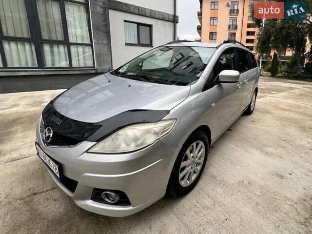 Серый Мазда 5, объемом двигателя 2 л и пробегом 273 тыс. км за 5200 $, фото 1 на Automoto.ua