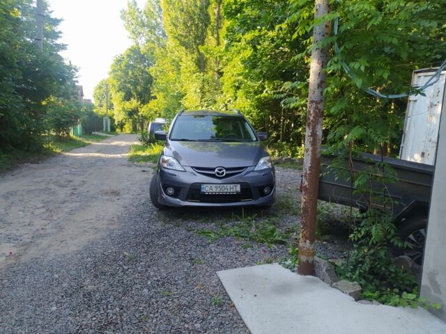 Серый Мазда 5, объемом двигателя 2 л и пробегом 230 тыс. км за 7000 $, фото 1 на Automoto.ua