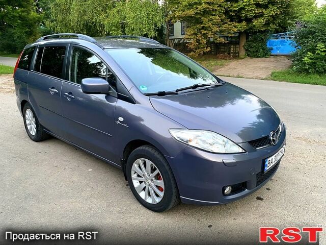 Серый Мазда 5, объемом двигателя 2 л и пробегом 185 тыс. км за 4650 $, фото 1 на Automoto.ua