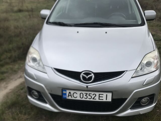 Серый Мазда 5, объемом двигателя 2 л и пробегом 213 тыс. км за 6000 $, фото 1 на Automoto.ua