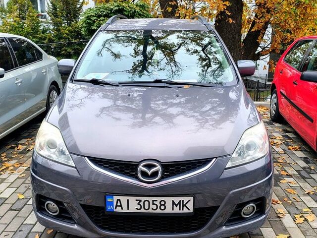 Серый Мазда 5, объемом двигателя 2 л и пробегом 240 тыс. км за 7000 $, фото 1 на Automoto.ua