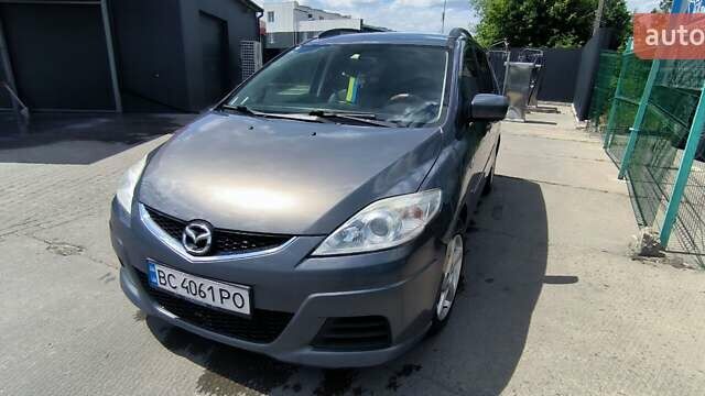 Серый Мазда 5, объемом двигателя 2 л и пробегом 245 тыс. км за 5940 $, фото 1 на Automoto.ua