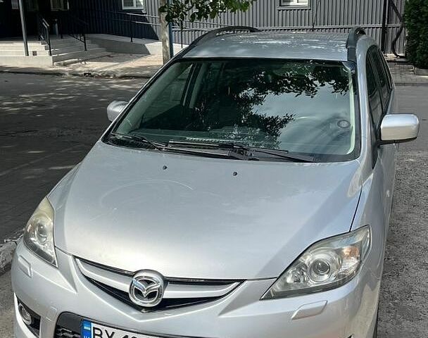 Серый Мазда 5, объемом двигателя 2 л и пробегом 182 тыс. км за 7050 $, фото 1 на Automoto.ua