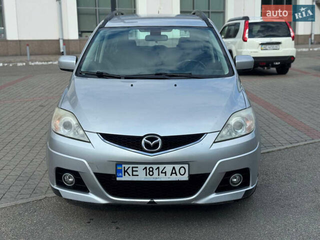 Серый Мазда 5, объемом двигателя 2 л и пробегом 244 тыс. км за 5600 $, фото 1 на Automoto.ua