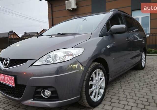 Серый Мазда 5, объемом двигателя 2 л и пробегом 193 тыс. км за 6950 $, фото 1 на Automoto.ua