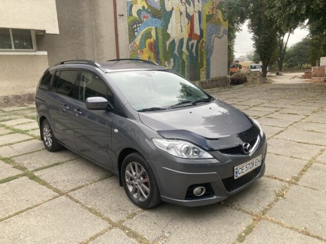 Серый Мазда 5, объемом двигателя 2 л и пробегом 269 тыс. км за 5450 $, фото 1 на Automoto.ua