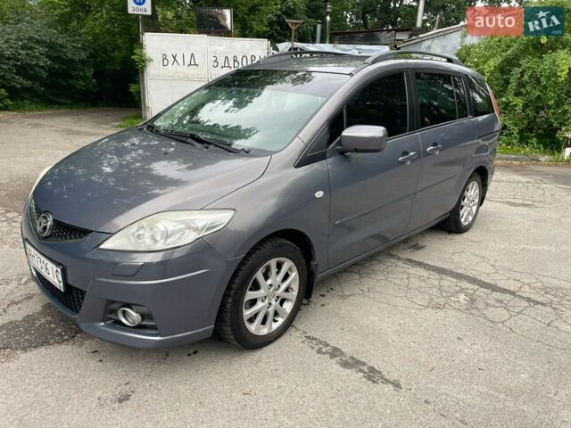 Серый Мазда 5, объемом двигателя 2 л и пробегом 233 тыс. км за 7000 $, фото 1 на Automoto.ua