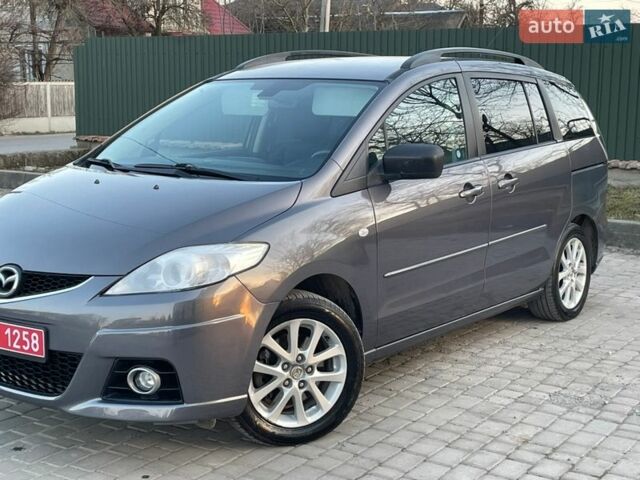 Серый Мазда 5, объемом двигателя 2 л и пробегом 227 тыс. км за 5190 $, фото 1 на Automoto.ua