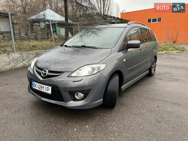 Серый Мазда 5, объемом двигателя 2 л и пробегом 250 тыс. км за 6999 $, фото 1 на Automoto.ua
