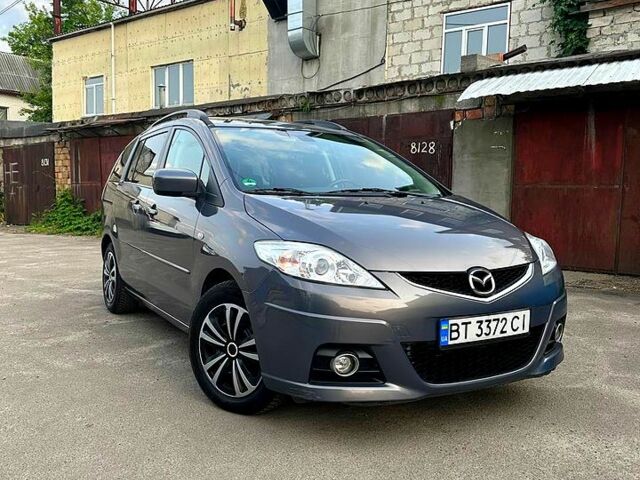 Серый Мазда 5, объемом двигателя 2 л и пробегом 261 тыс. км за 6800 $, фото 1 на Automoto.ua