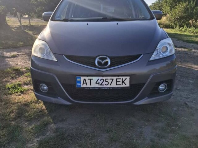 Серый Мазда 5, объемом двигателя 2 л и пробегом 247 тыс. км за 6800 $, фото 1 на Automoto.ua