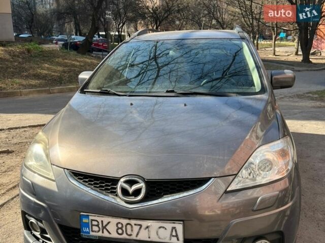 Серый Мазда 5, объемом двигателя 2 л и пробегом 292 тыс. км за 3800 $, фото 1 на Automoto.ua