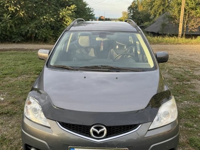 Серый Мазда 5, объемом двигателя 2 л и пробегом 285 тыс. км за 5372 $, фото 1 на Automoto.ua
