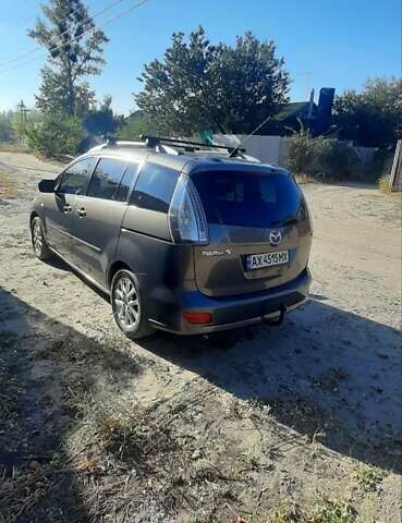Сірий Мазда 5, об'ємом двигуна 2 л та пробігом 220 тис. км за 7600 $, фото 1 на Automoto.ua